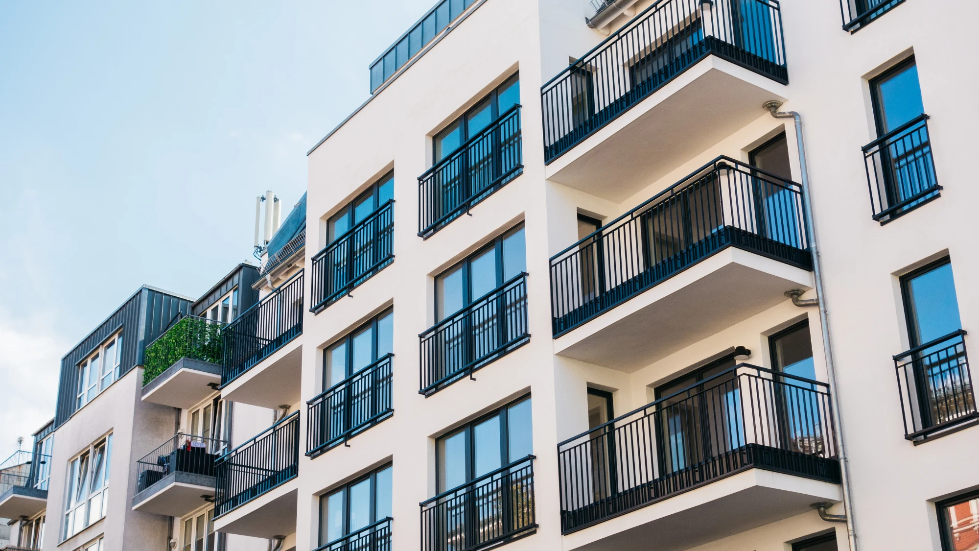 Multifamily bridge loan funding for purchasing a residential building.